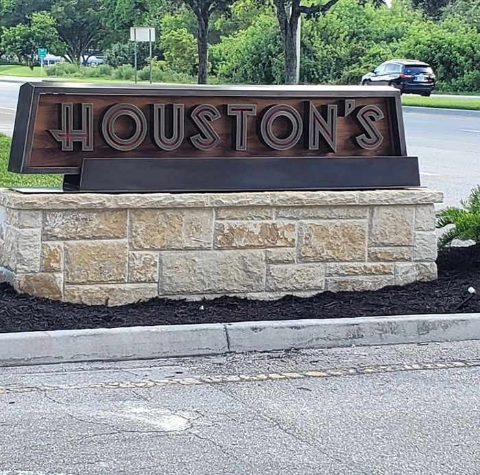 A sign that says Houston's on it