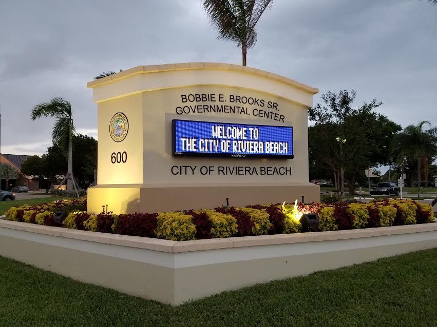 A sign that says Welcome to the City of Riviera Beach
