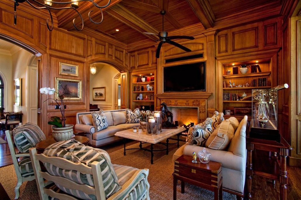 A living room filled with furniture and a fireplace.