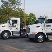 Mike's Wrecker Service logo