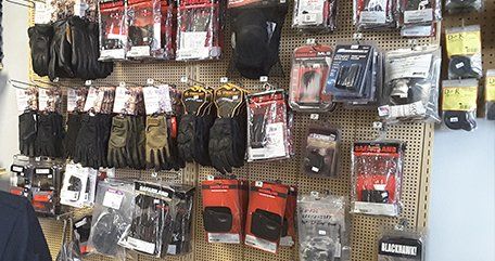 gloves, flashlight and duty gear accessories