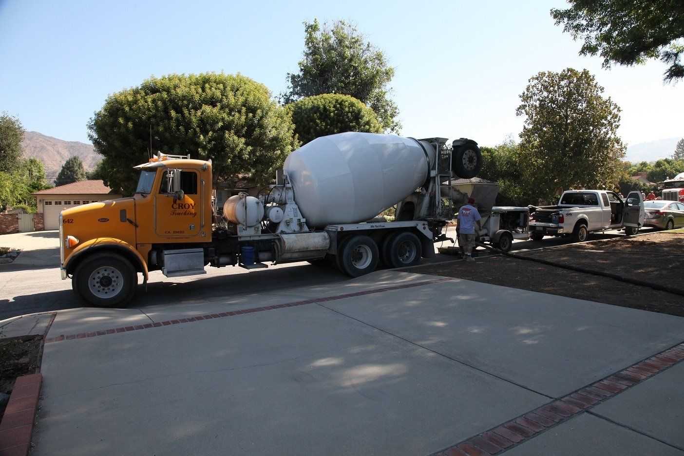 Cement mixer and service vehicle