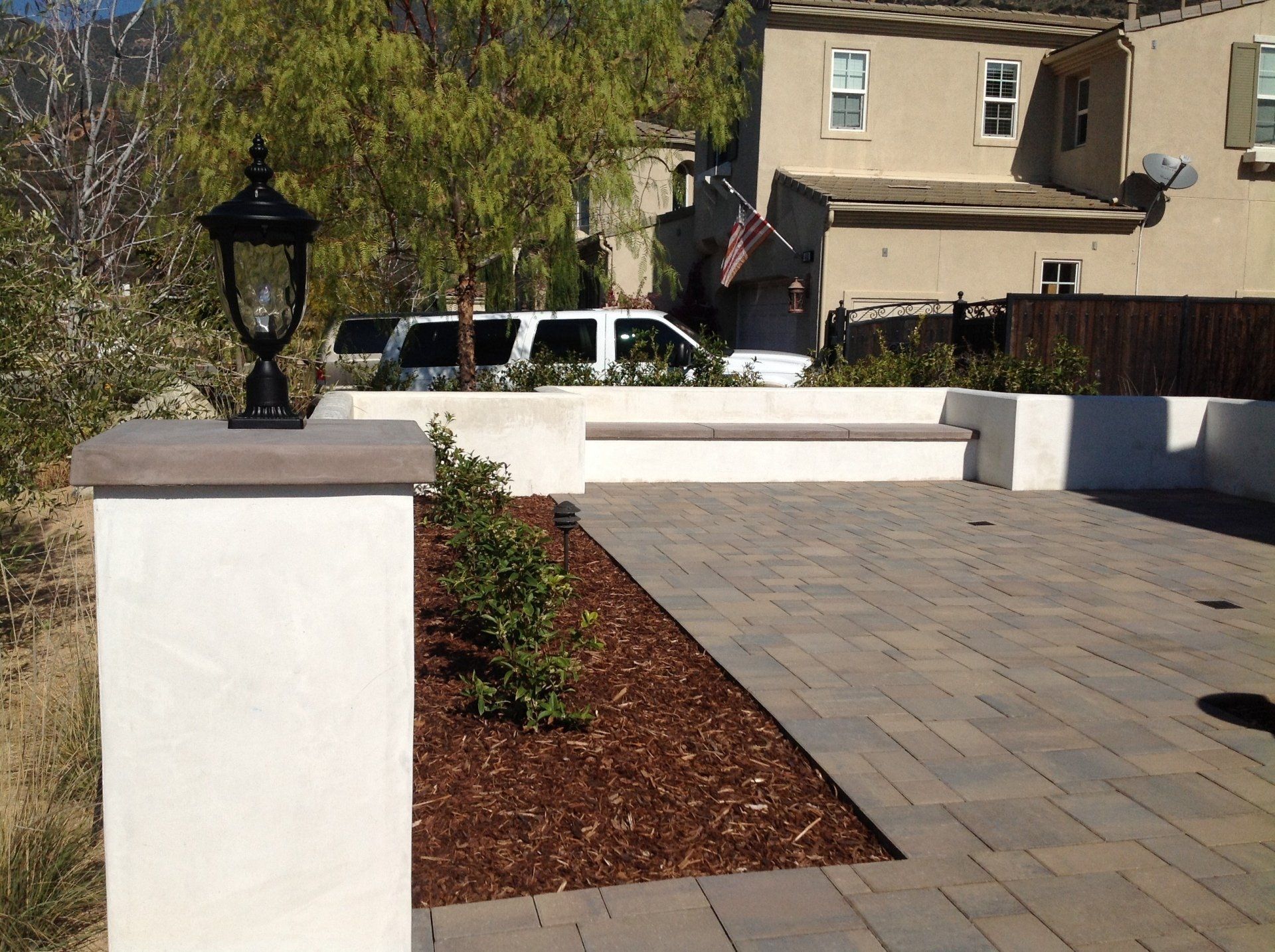 Post lamp and concrete patio