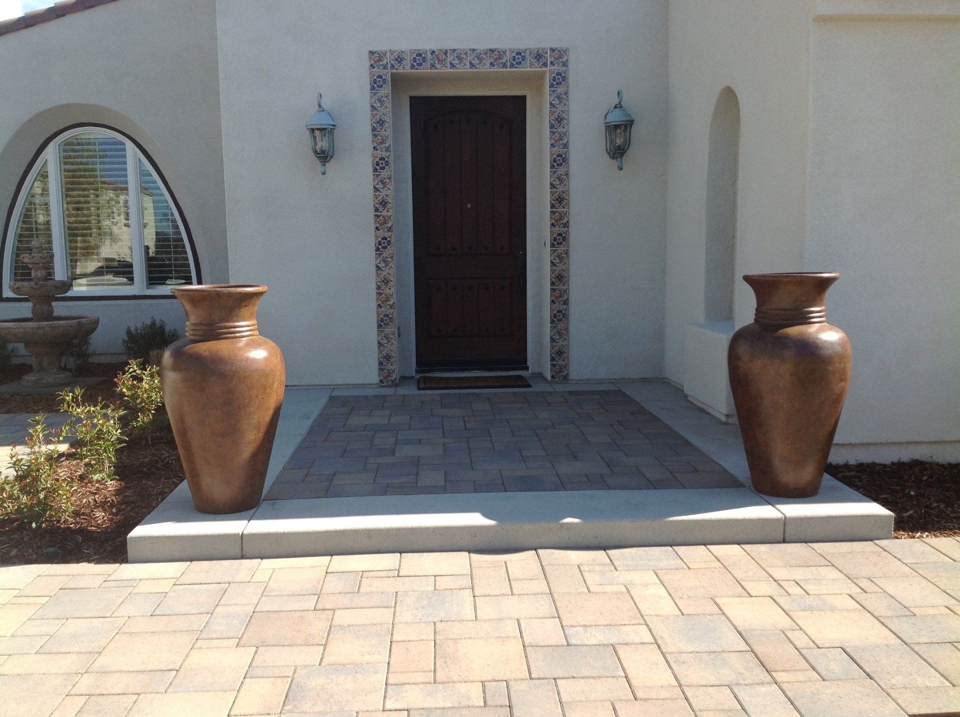 Beautiful house with stylish concrete walkway