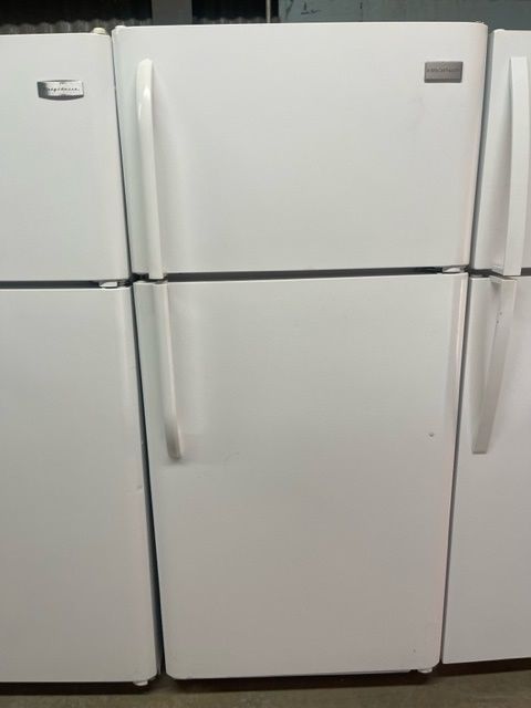 Two door white refrigerator with white handles