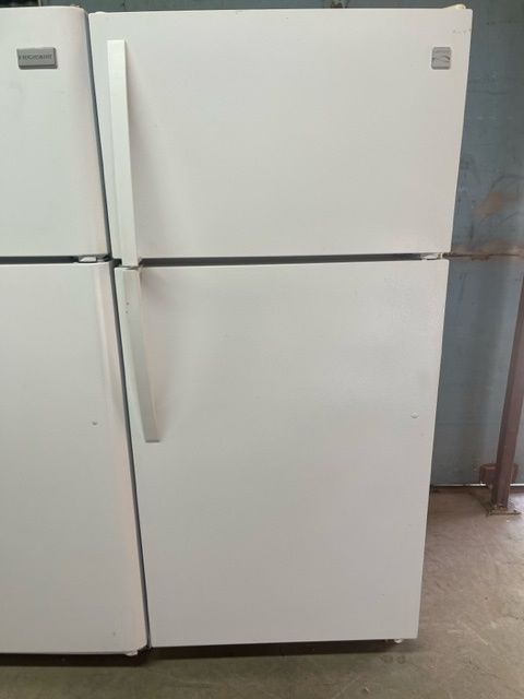 Top freezer white refrigerator