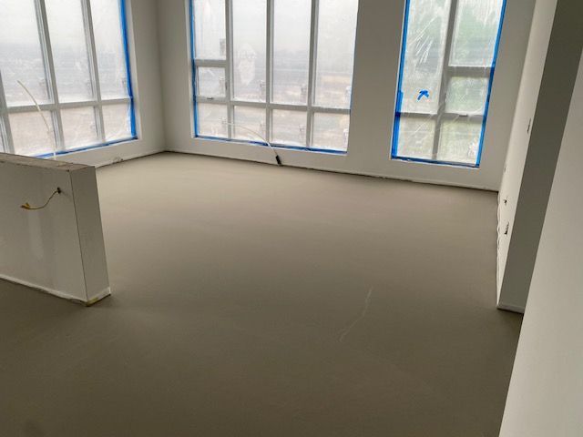 a large room with a lot of windows