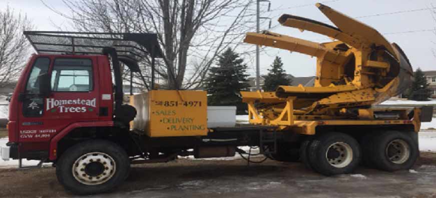 Truck with tree remover equipment