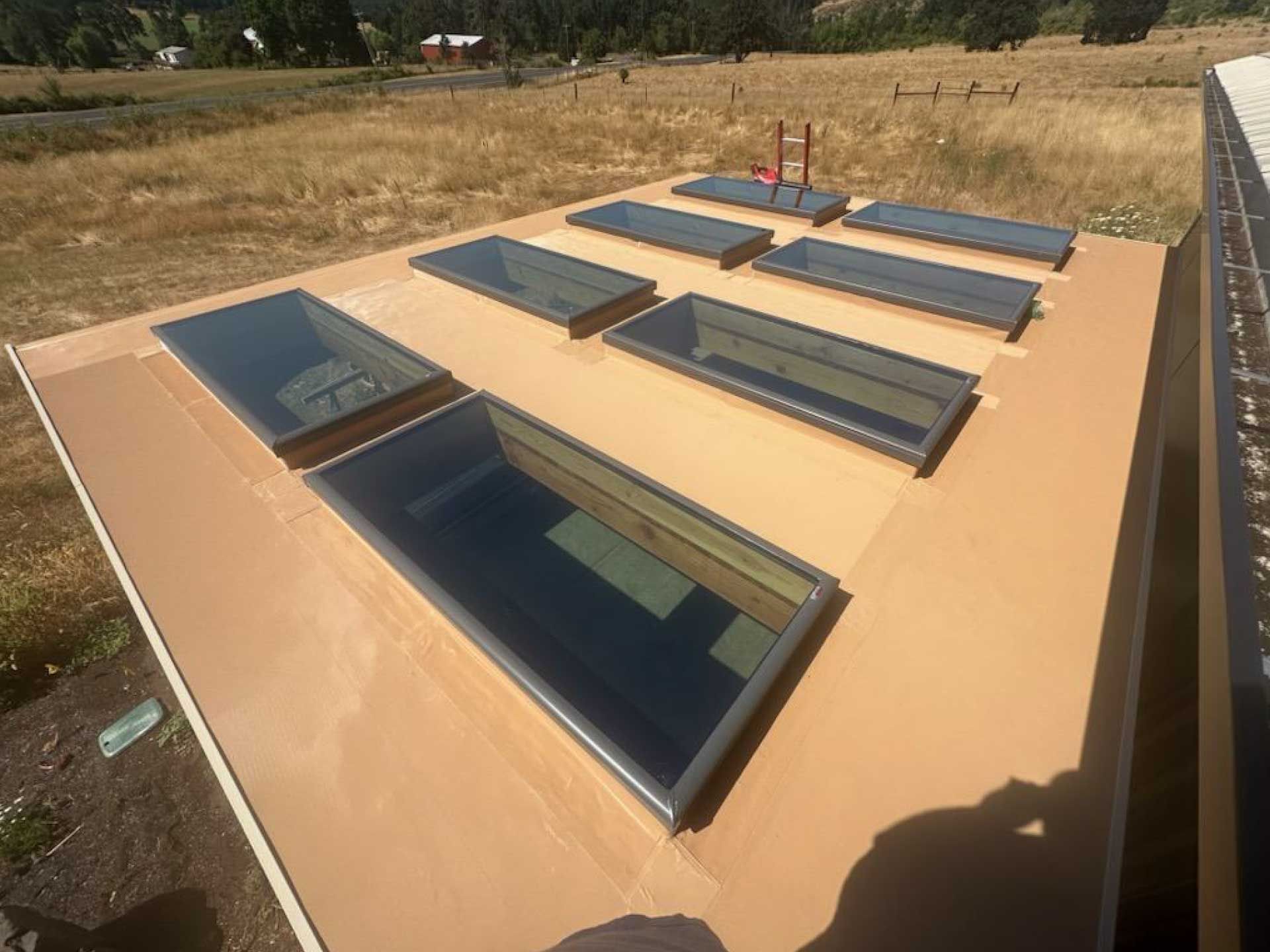 flat roof with several rectangular skylights