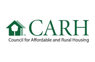 Logo: CARH (Council for Affordable and Rural Housing), green house and tree symbol, text in dark green.