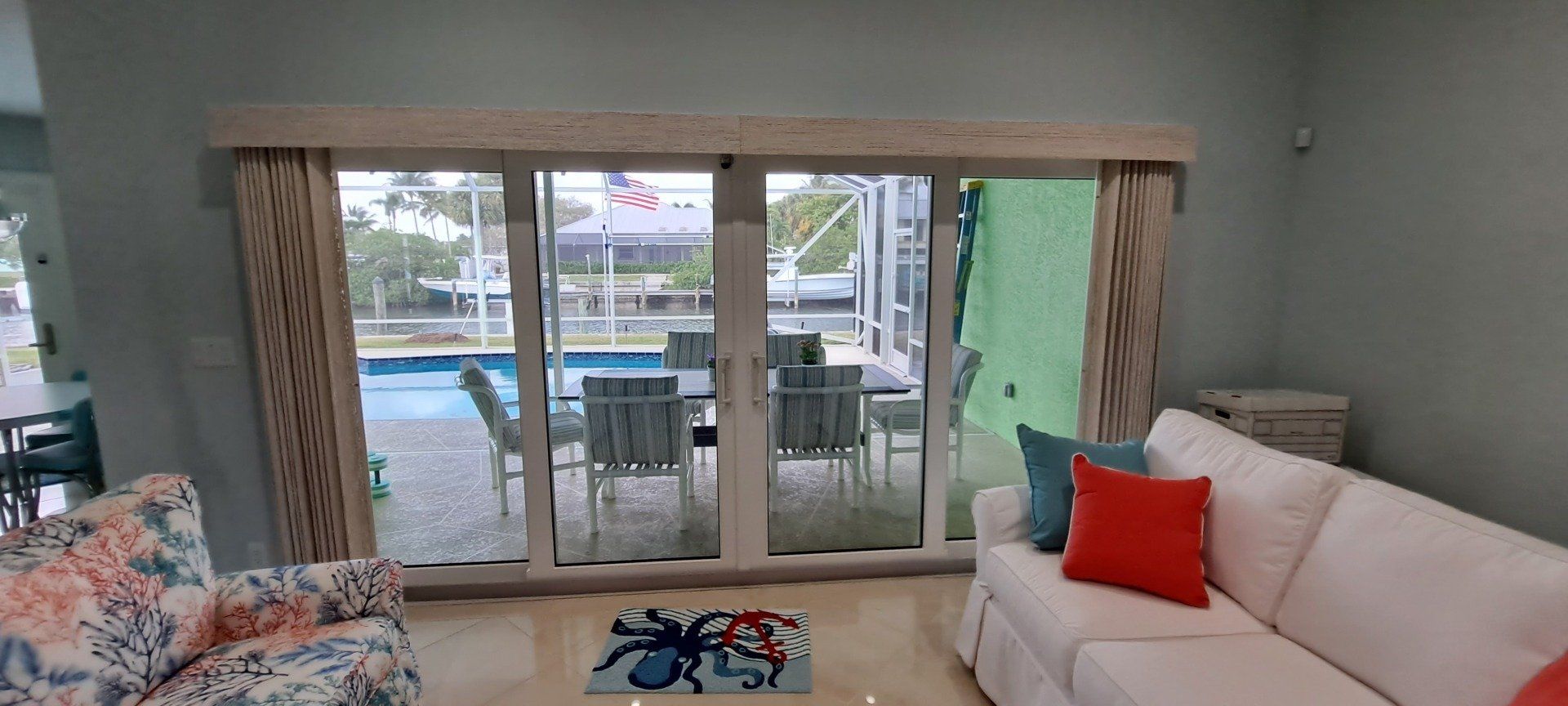 elegant living area with a swimming pool view