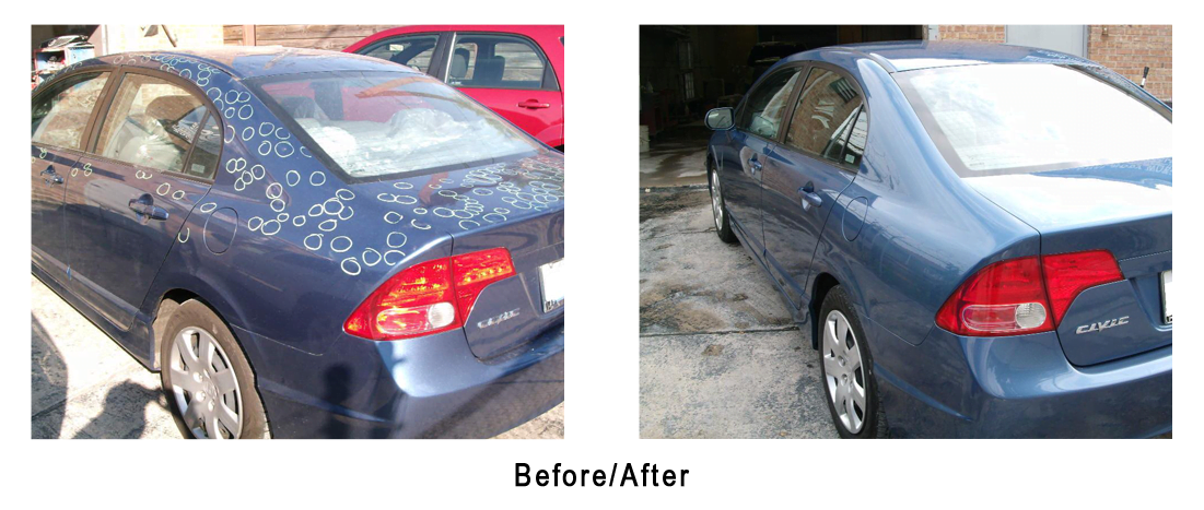 A blue car is parked in a parking lot next to a red car.