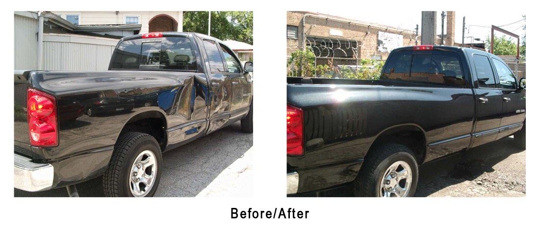 A black truck is parked in front of a house.