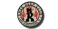 Circular logo for the Knee Deep Club in Lake Hopatcong, N.J., featuring a stylized black 