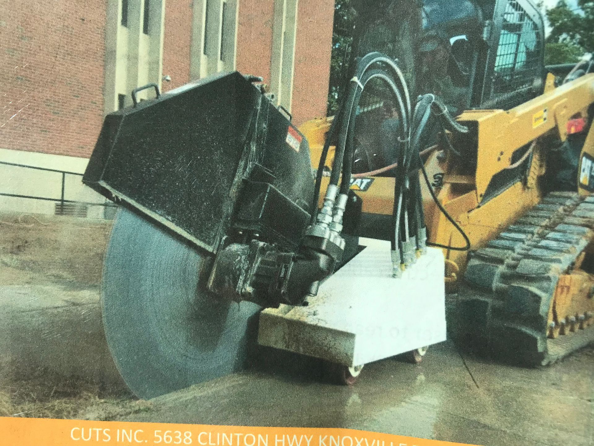 A picture of a machine that says cuts inc