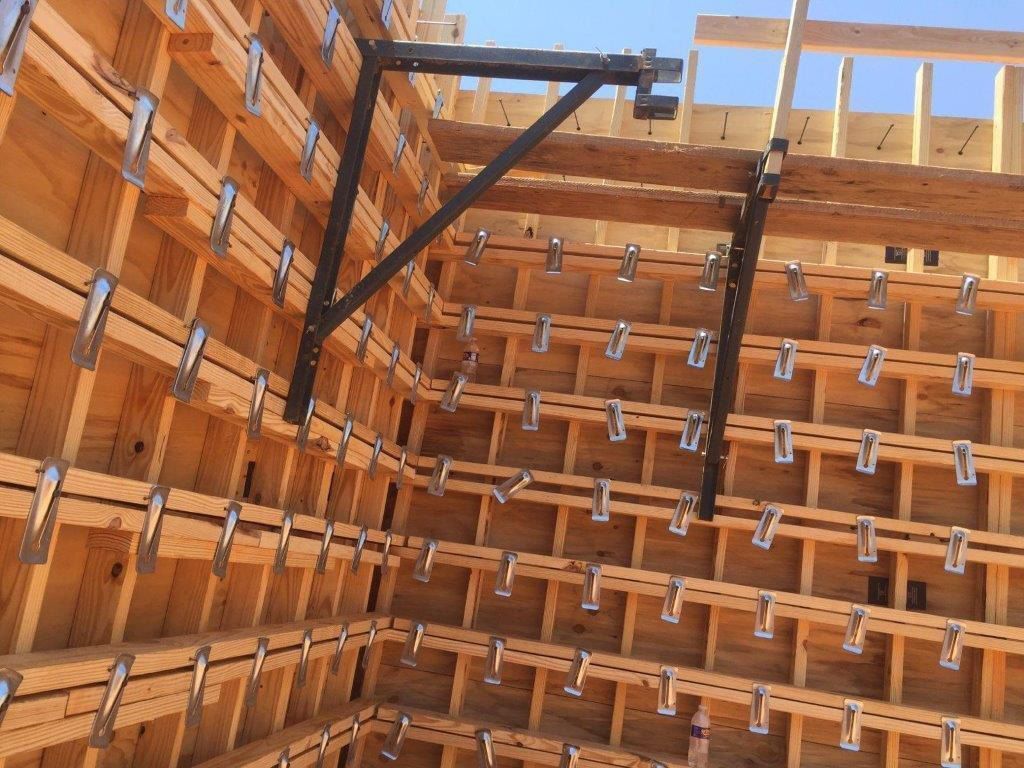 A building under construction with a lot of wooden beams.