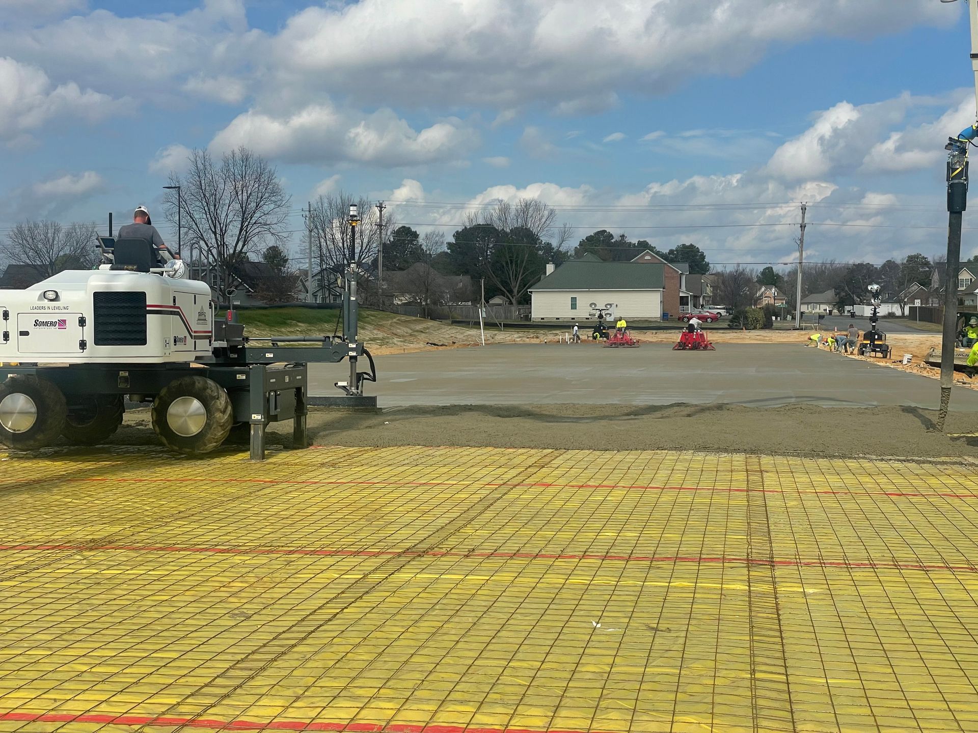 A white tractor with the number 44 on it