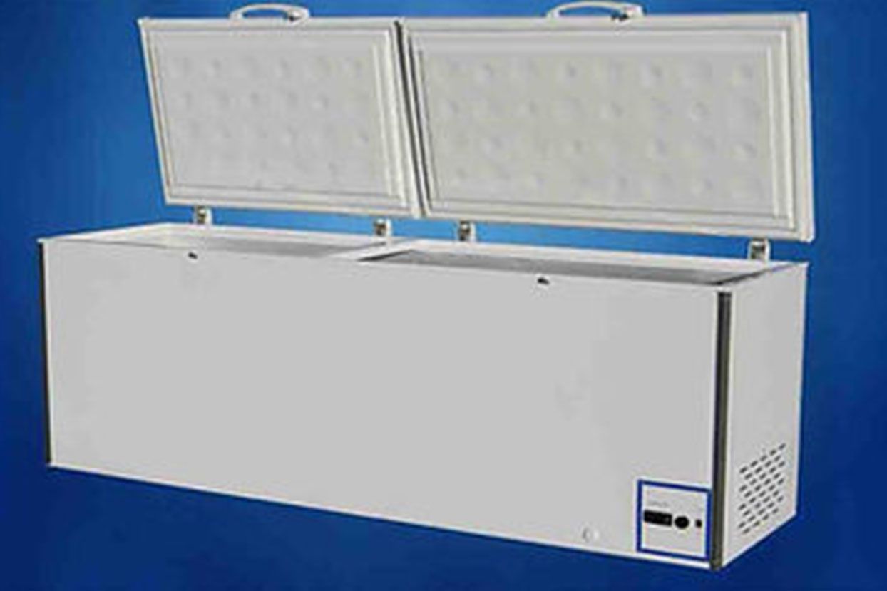 A white freezer with the doors open on a blue background