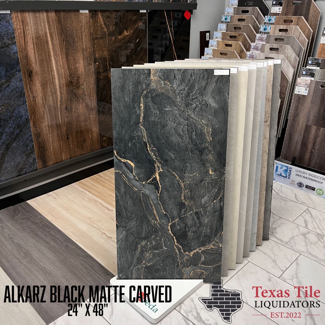 A display of black matte carved tiles from texas tile liquidators