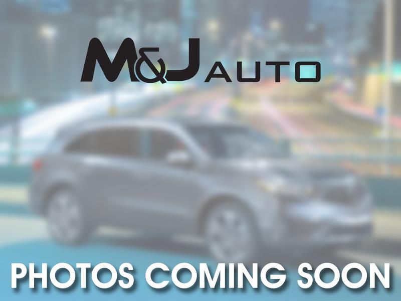 M&J Auto logo over blurred gray car with “Photos coming soon” text