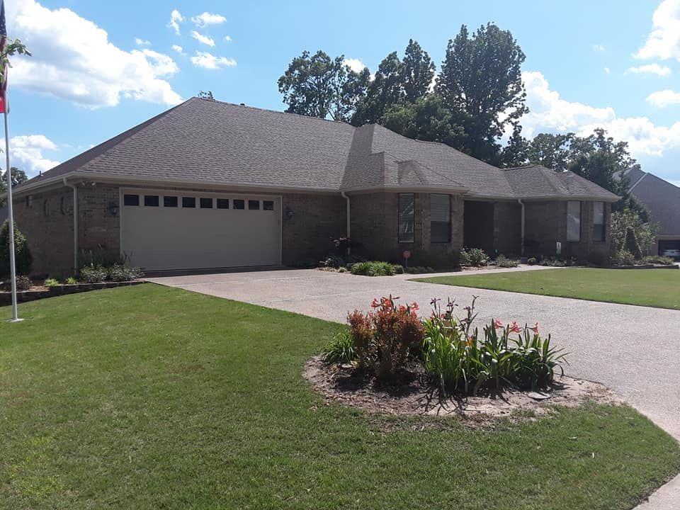 A large house with a flag in front of it