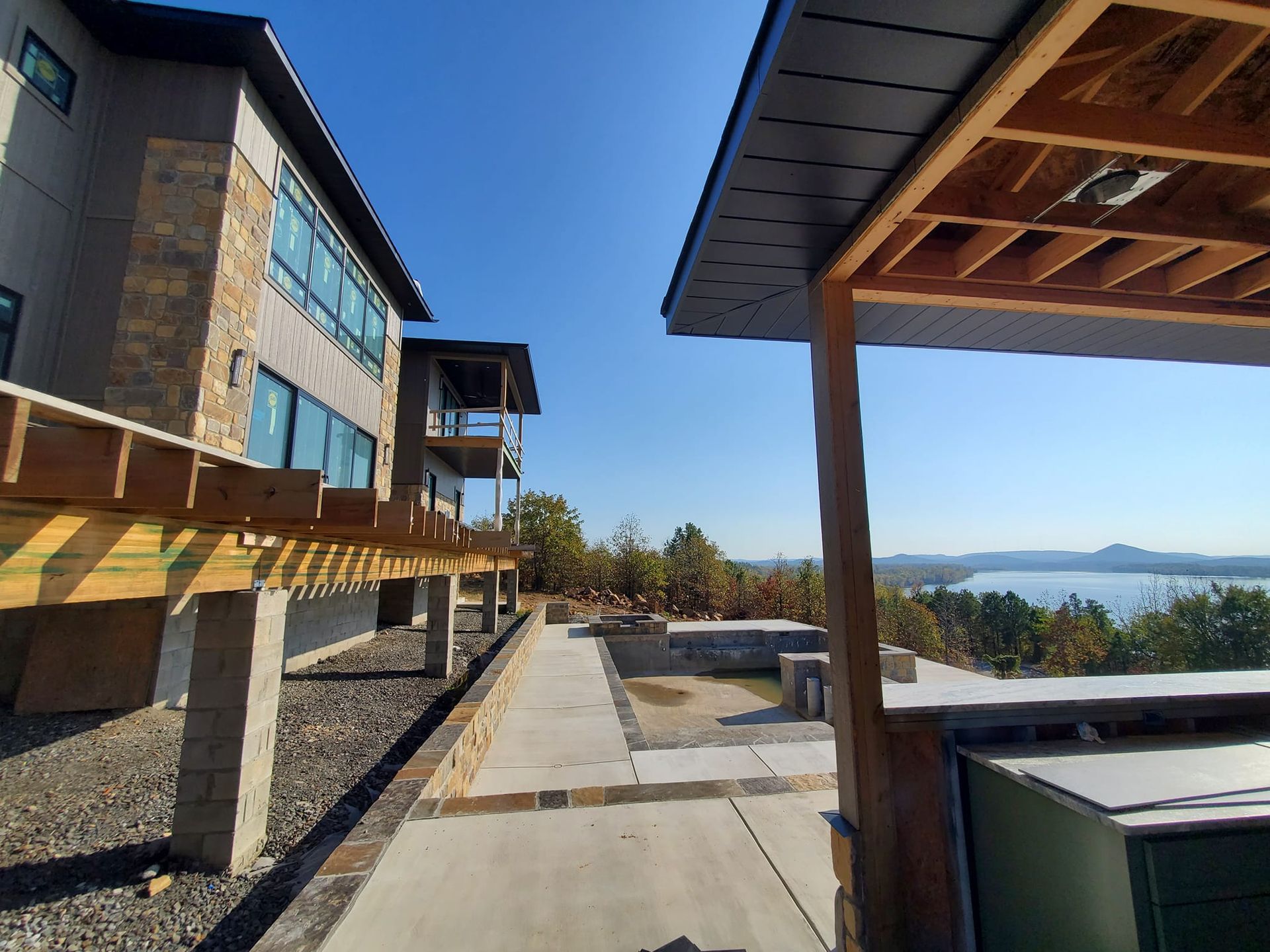 A large building with a view of a lake is being built