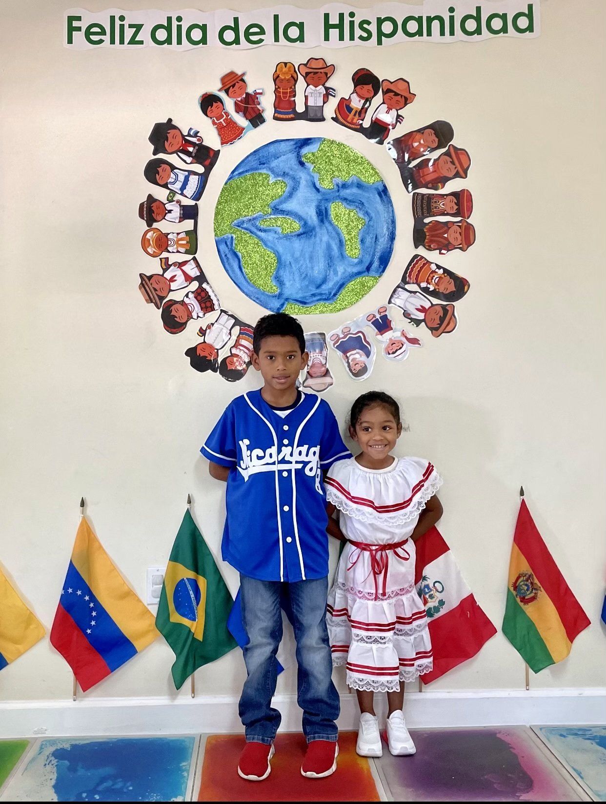 boy and girl dressed for heritage month
