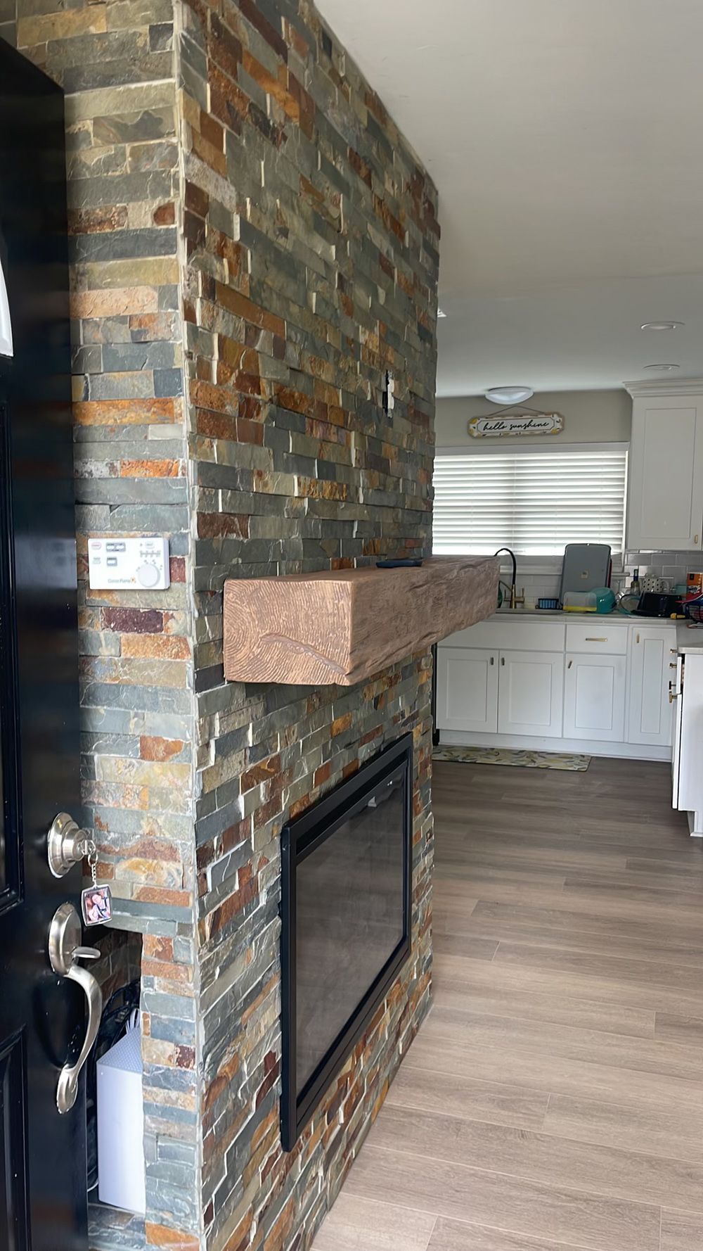 There is a fireplace in the middle of the room.