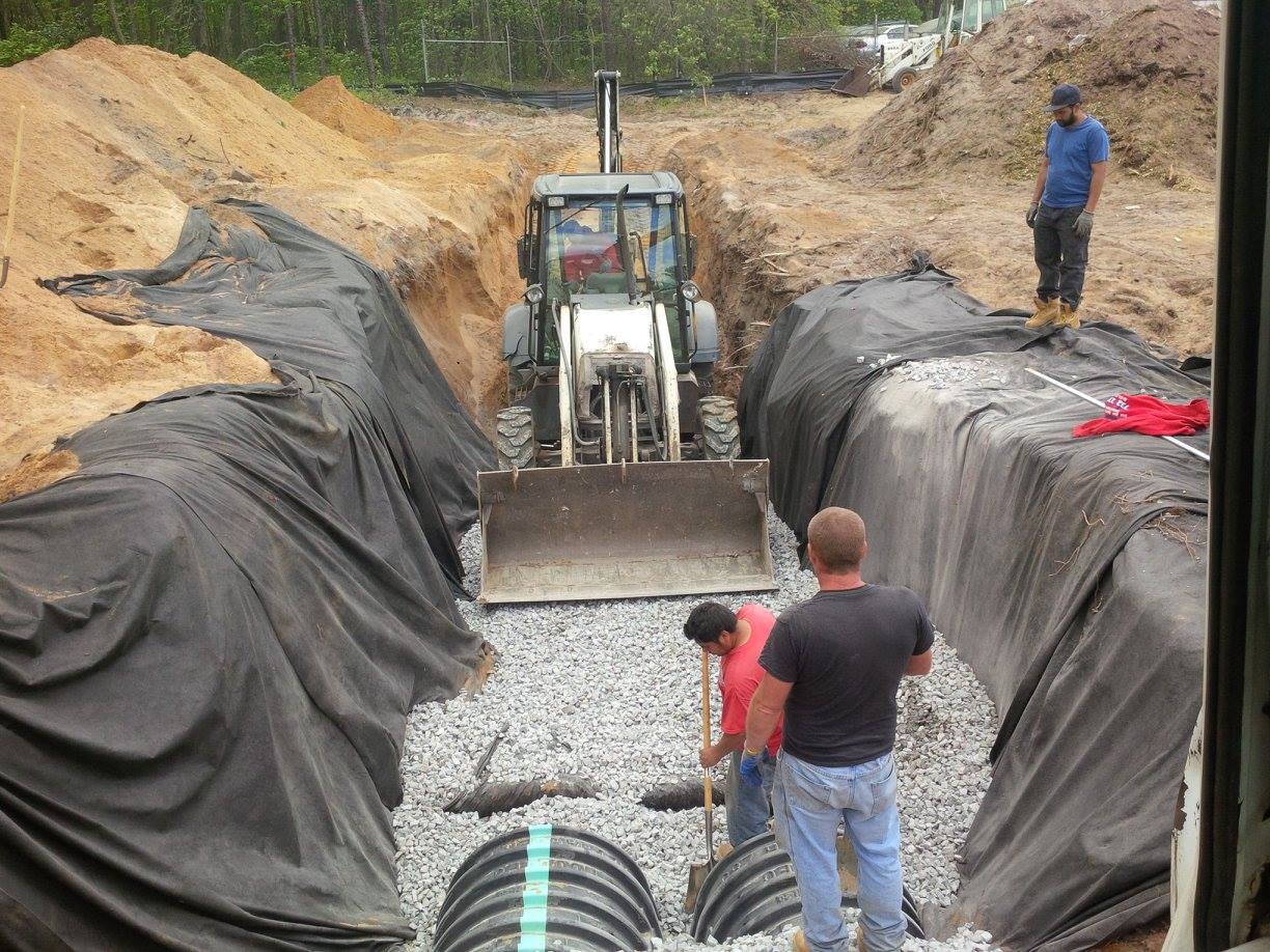 A bulldozer is digging a hole in the ground