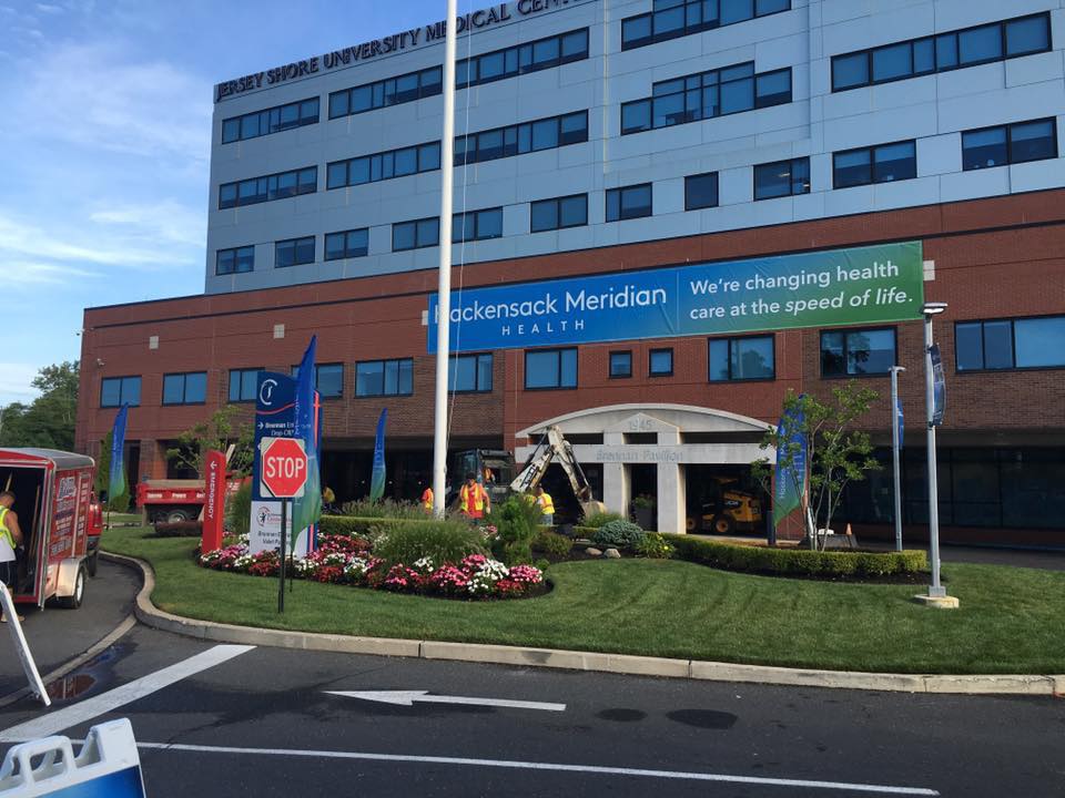 A large building with a stop sign in front of it