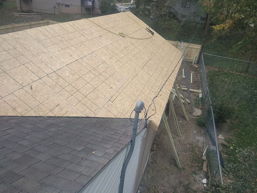 An aerial view of a roof that is being built.