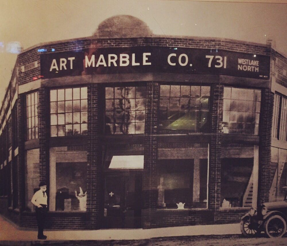 A black and white photo of the art marble co.