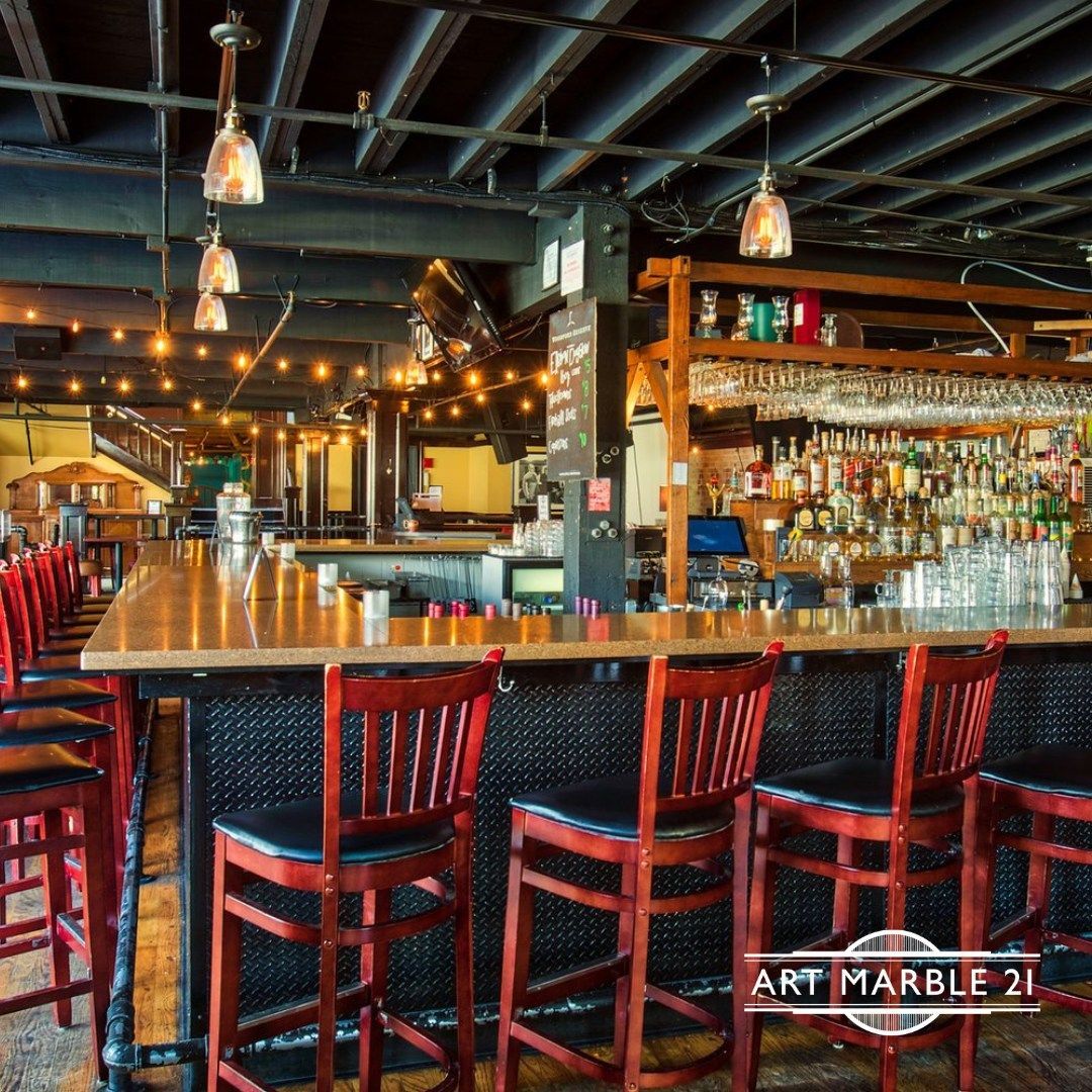 A pool table in an Art Marble 21 pool hall