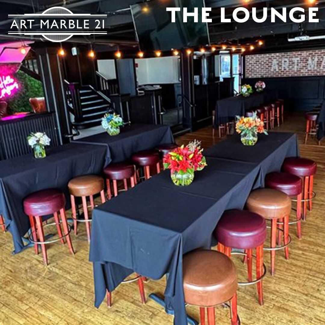 The lounge at Art Marble 21 has tables and stools