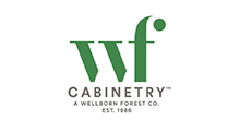 A green and white logo for cabinetry a wellborn forest co.