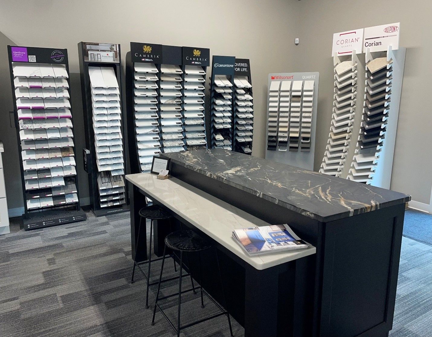 A room filled with lots of displays of different types of tiles and counter tops.