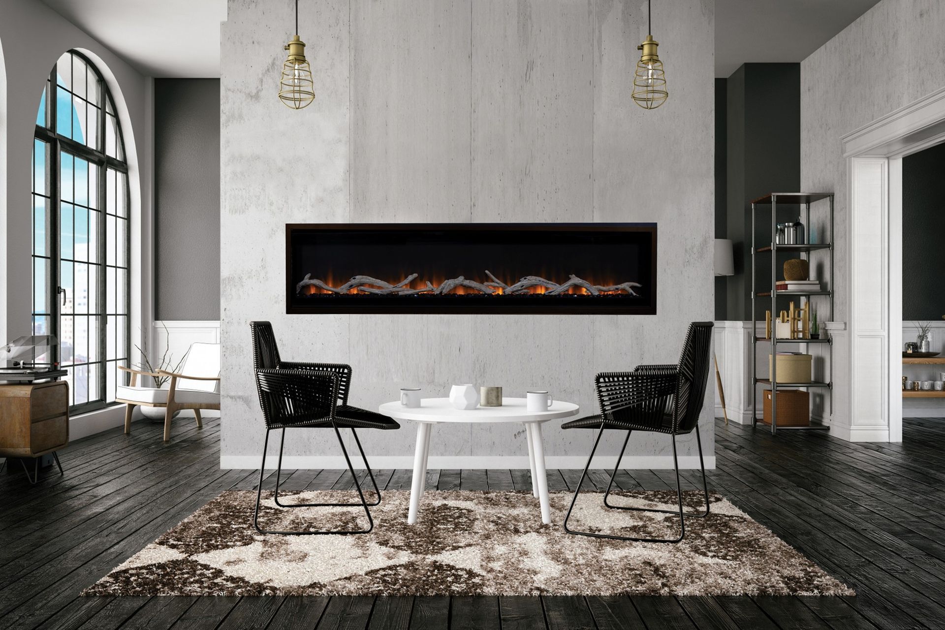 Modern living room with black fireplace, white chair, and rug on dark wood floors.