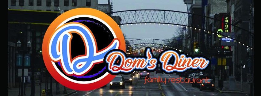 The logo for dom 's diner is on a city street