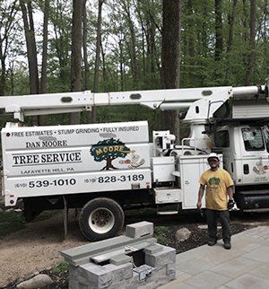 Dan Moore Tree Service truck and man
