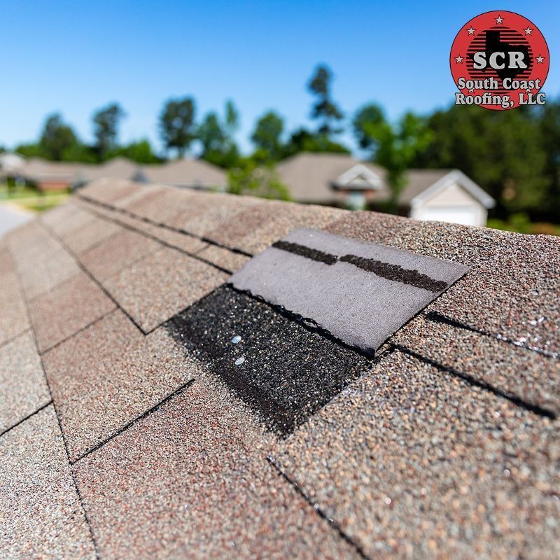 A close up of a roof with a scr logo on it