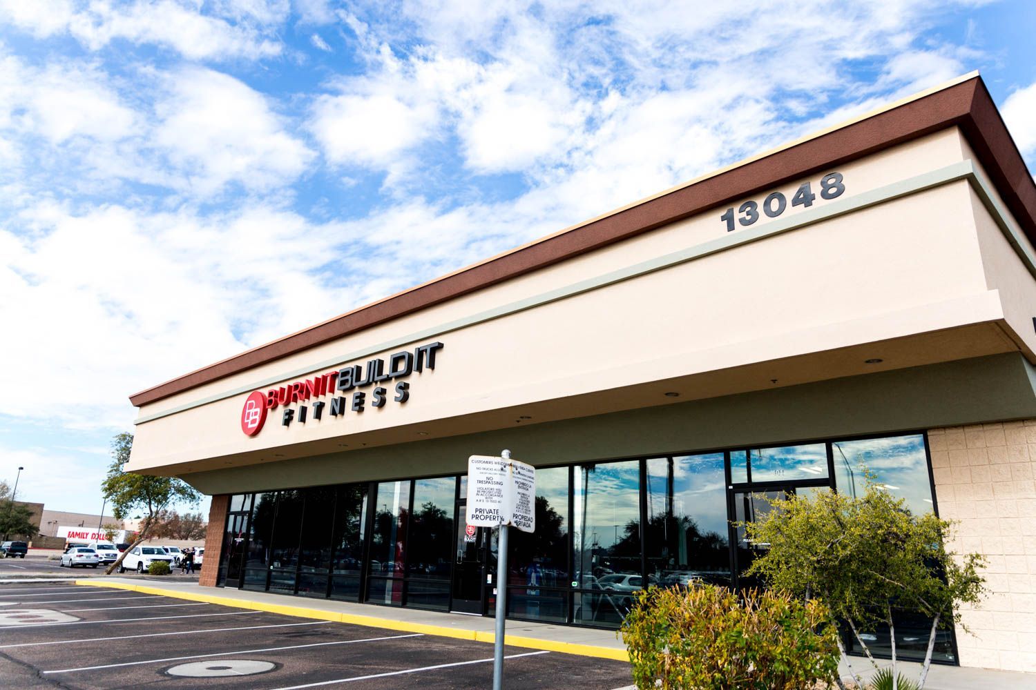 Paramount City Express restaurant, beige building with large windows, 13048 address, blue sky.