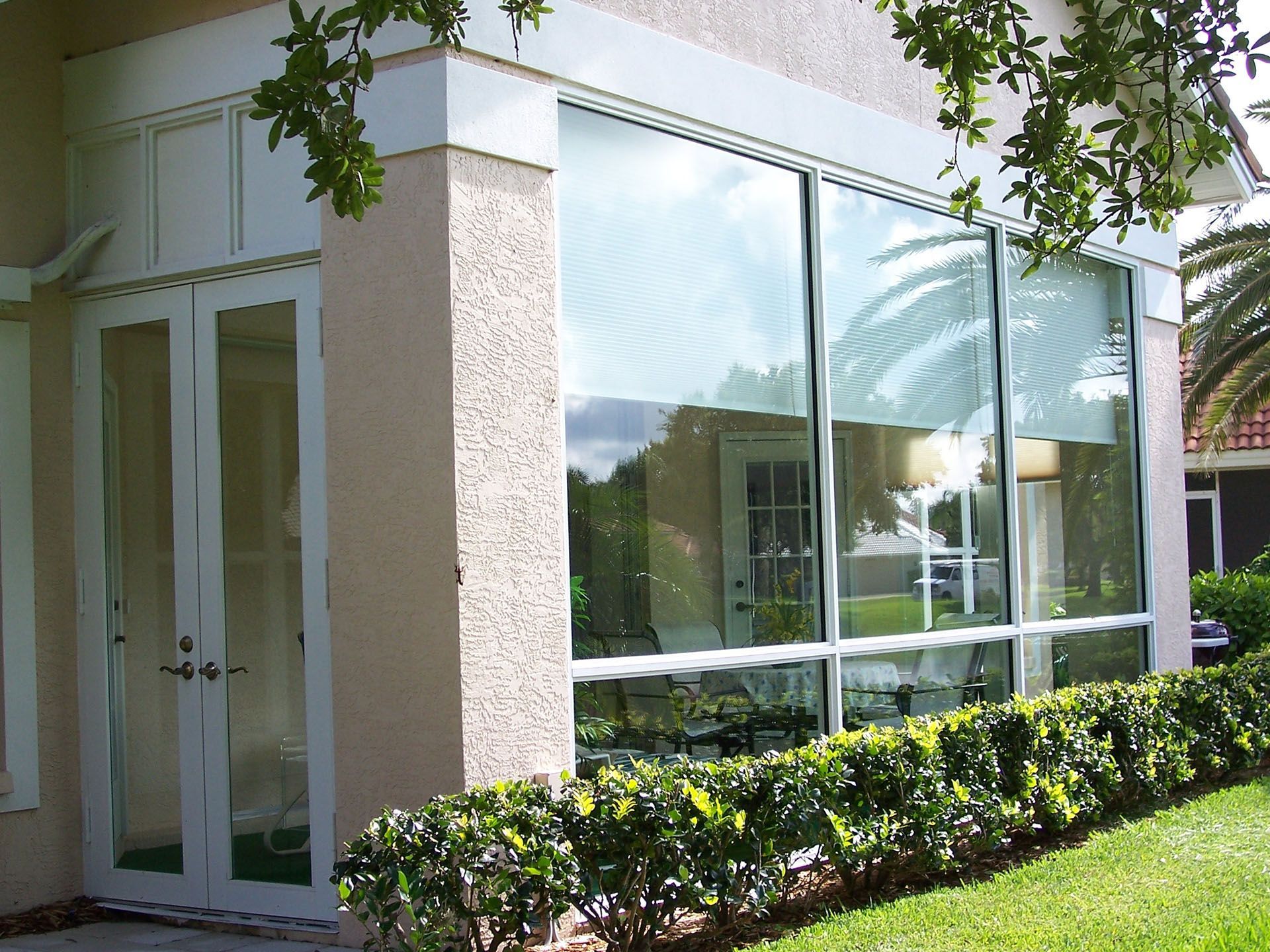 A house with a lot of windows and doors