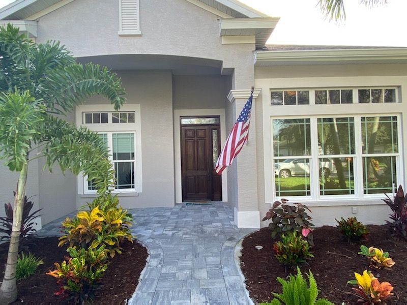 A house with a flag in front of it