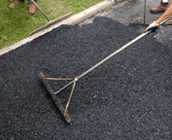 compactor lays asphalt