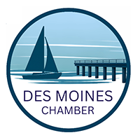 Des Moines Chamber logo with sailboat and pier in a blue circular design