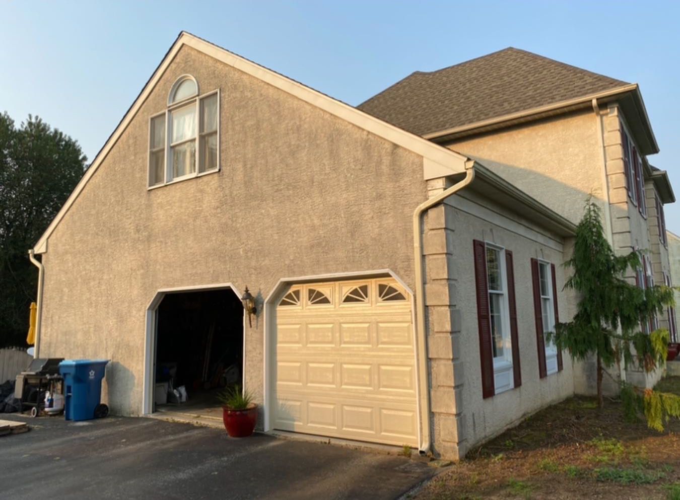 A large house with a garage and a driveway