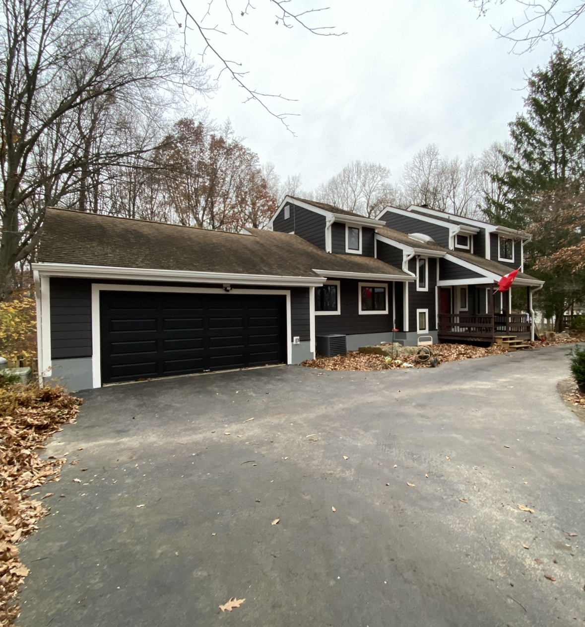 A large house with a garage and a driveway