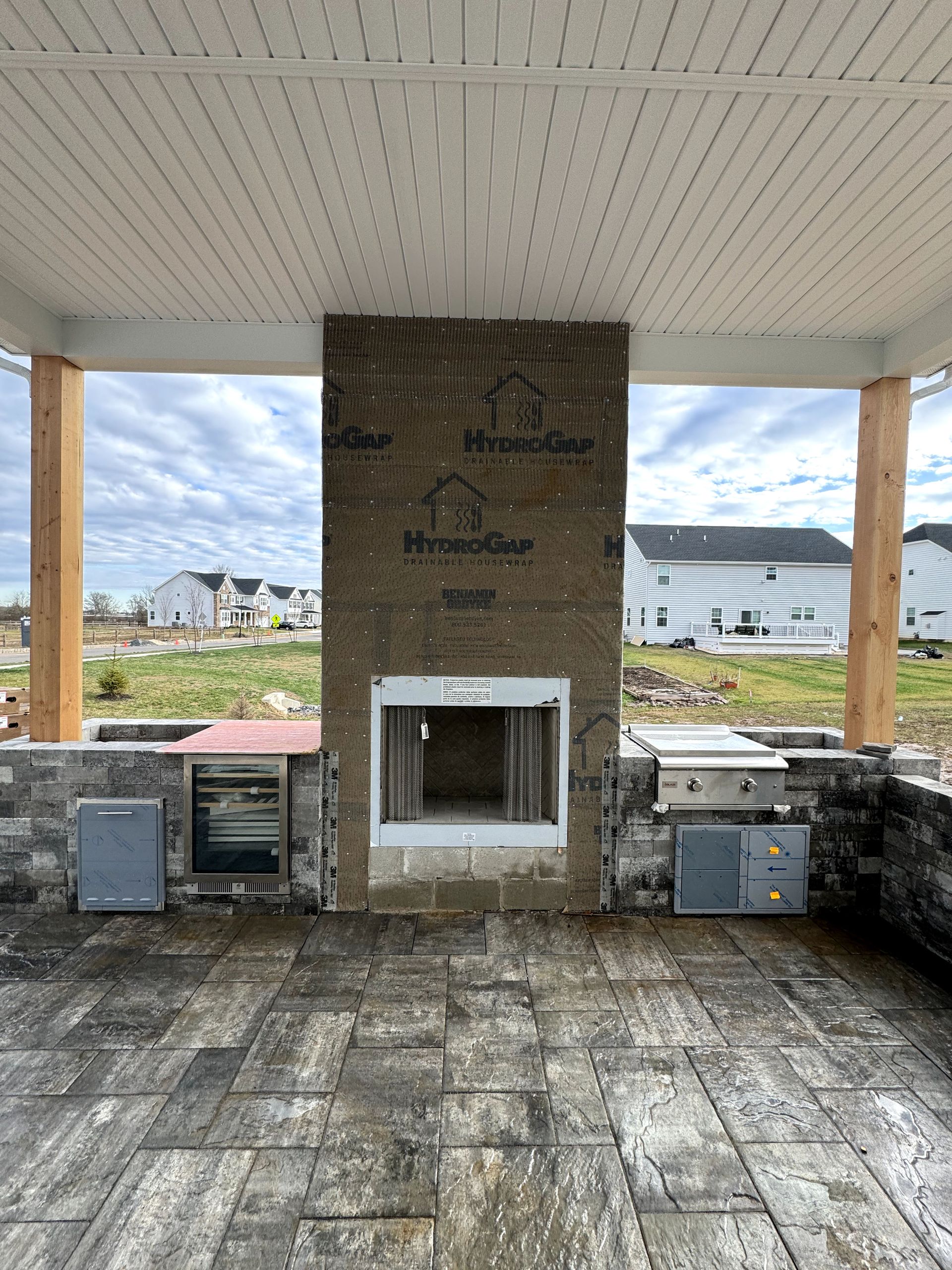 There is a fireplace in the middle of the room.