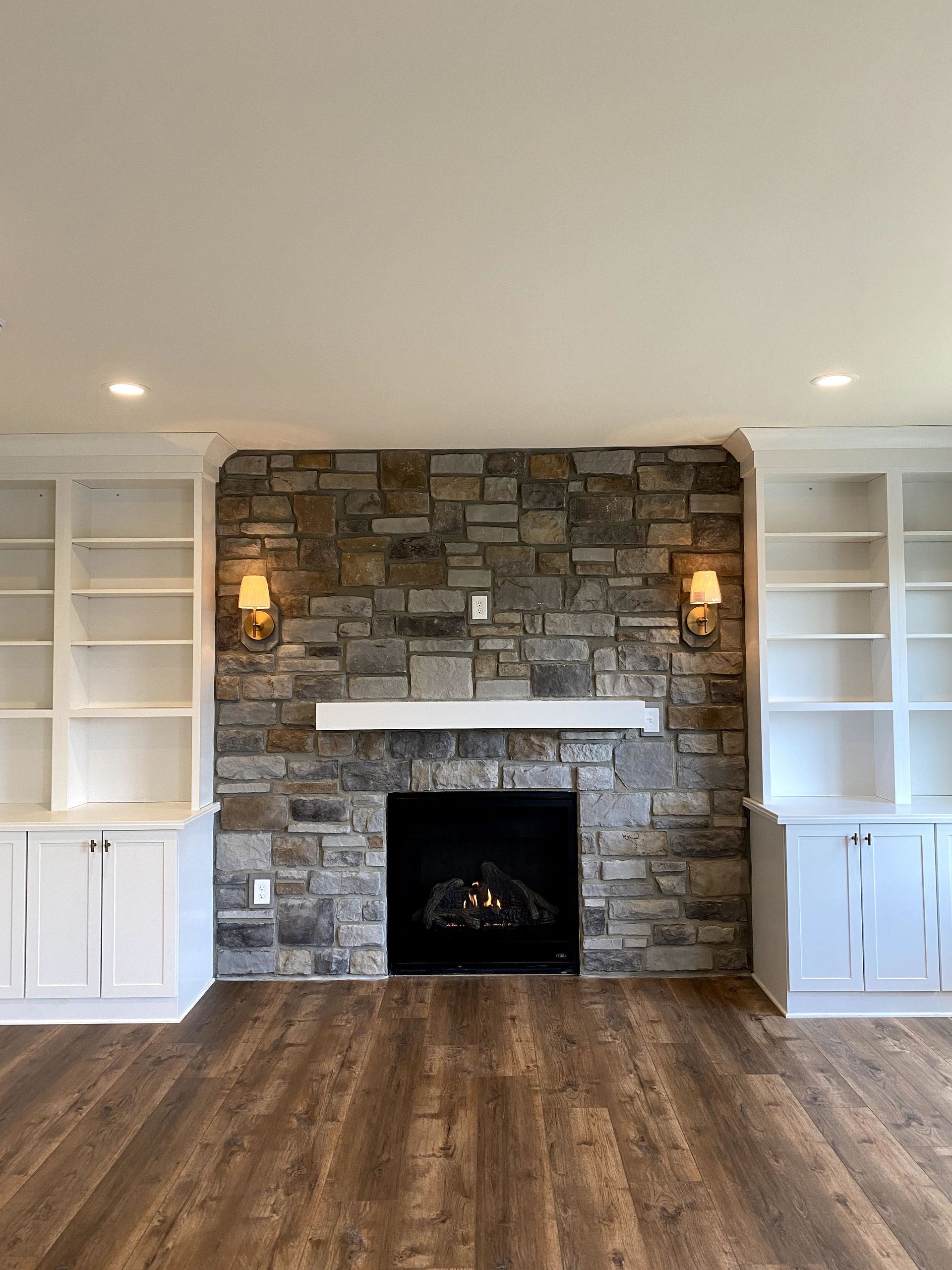 There is a fireplace in the middle of the room.