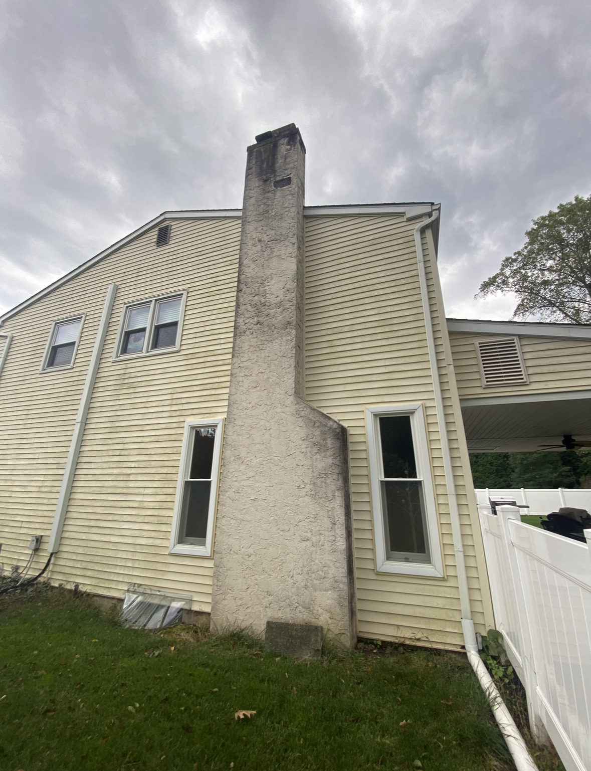 A house with a chimney on the side